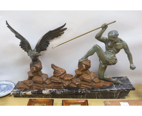 An Art Deco patinated spelter model of a hunter and eagle on a marble base - 77cm
