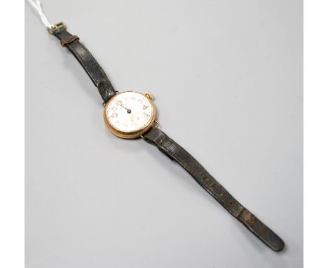 A gentleman's 9ct gold manual wind wrist watch, a.f. gross weight 29.7 grams.