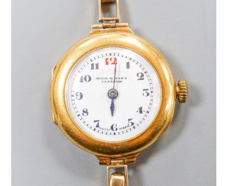 A lady's George V 18ct gold cased manual wind wrist watch, lacking bracelet, case hallmarked for Birmingham, 1917, retailed b