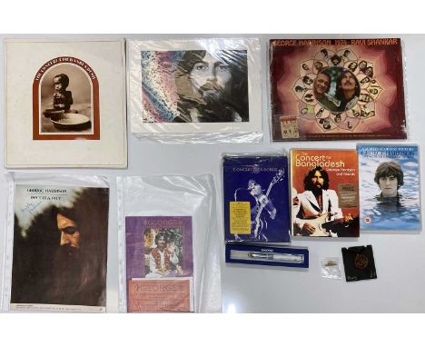 A collection of George Harrison Memorabilia to include a 1974 programme &amp; ticket, three George Harrison DVDs, a Swarovski