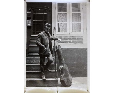 A limited-edition poster print of Stuart Sutcliffe in Hamburg in 1960. Numbered 212/300 and signed by Astrid Kirchherr in pen