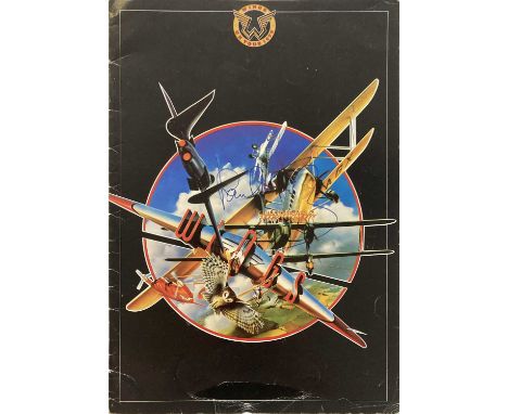 A 1979 Wings on Tour programme signed in blue ink to front cover by Paul McCartney. Some creasing and wear to covers. Authent