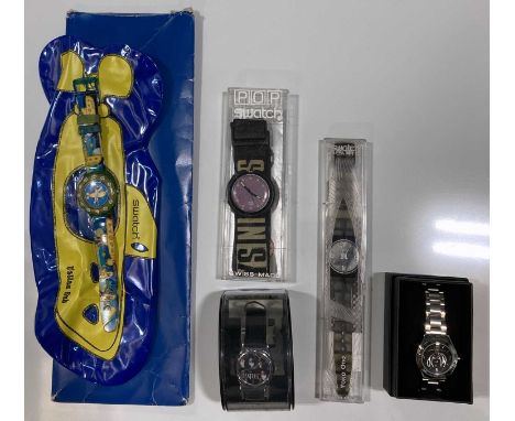 A collection of five watches to include a Yoko Ono Swatch, a Yellow Submarine Swatch with an inflatable plastic submarine sha