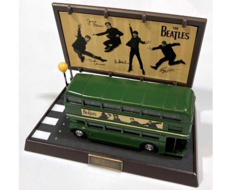 An Apple Corps Beatles Double Decker Routemaster Bus Telephone in original box which says it has original styling details, Be