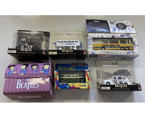 Six Beatles collectables: 2005 Vandor lunchbox, 1997 Corgi Bedford MMT bus 35302 in box, 2000 Corgi Routemaster 32304 in box,