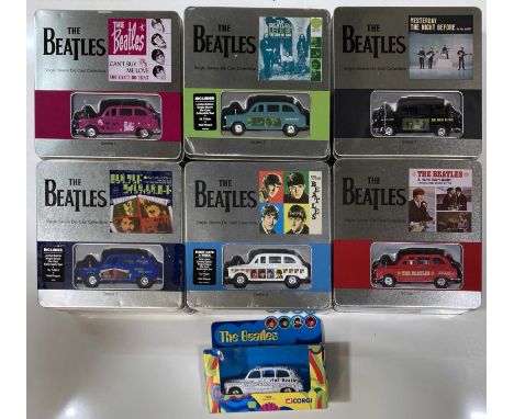 A collection of seven Beatles Taxi models to include six series 1 &amp; 2 Single Sleeve Die Cast Collectibles (Yesterday/The 