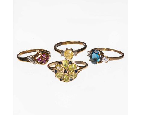 FOUR 9 CARAT GOLD GEM-SET RINGS comprising a yellow sapphire and diamond three stone ring, hallmarked London 1981, ring size 