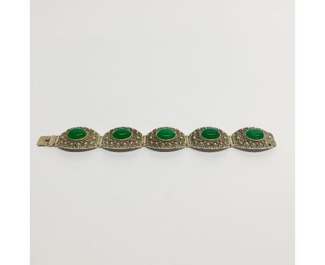A lovely Chinese white metal and green jade bracelet.