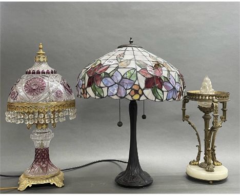 A Tiffany style table lamp, H. 57cm, together with two further table lamps. Tiffany shade A/F.