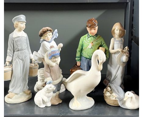 A group of Lladro, Coalport and Doulton figurines, tallest H. 22cm.