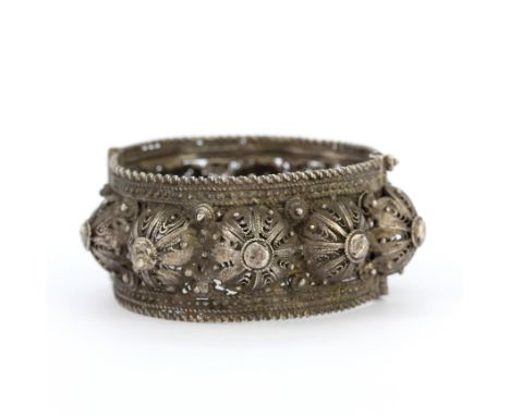 A heavy white metal (tested silver) bangle, internal dia. 5.5cm.