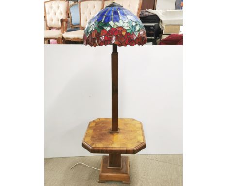 An Art Deco burr walnut veneered standard lamp side table, H. 155cm together with a detached Tiffany style lamp shade A/F.