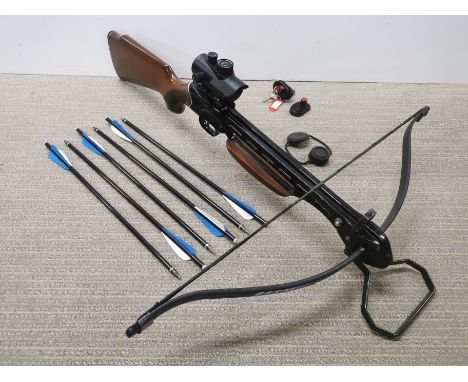 A Barnett Veloci-Speed crossbow R glass with 6xbolts, trigger lock and electronic scope, approx L. 85cm.