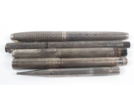 A silver bodied 'Battle Axe' fountain pen, with engraved floral decoration, inscribed, Chester 1902; a Shaeffer pen, two furt
