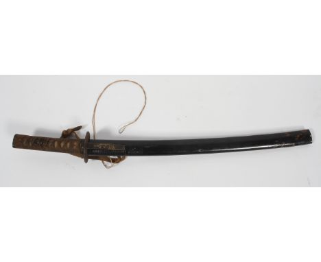 A Japanese Wakizashi sword, with 52cm blade, iron Tsuba with figures, heightened in gilt, shagreen grip, foliate gilt and iro