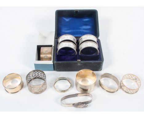 A collection of napkin rings, to include a Britannia Standard matted and bright cut example, Birmingham 1966, 2.5cm x 4.5cm; 