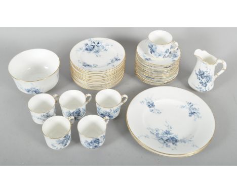 A Royal Worcester part tea service, late 19th century, printed blue marks, printed with loose flower sprays, to include: tea 