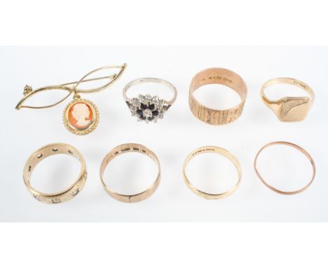 A collection of jewellery to include: Five yellow metal wedding rings of variable designs, size range from N to T, each indiv