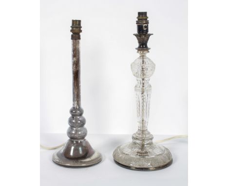 A cut glass lamp base, with silver plated marks and swagger and foliate decoration, 42cm high; together with a silvered glass