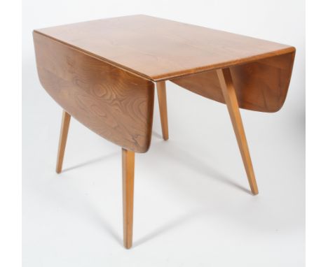 An Ercol light elm and beech drop leaf dining table, mid 20th century, on tapering legs, 77cm high x 63cm wide (folded) x 110