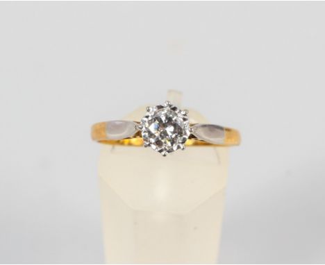 A yellow and white metal single stone ring. Illusion set with a round brilliant cut diamond estimated to weigh 0.33cts. Colou