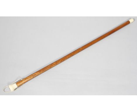 An early 20th century malacca sword stick with 72cm steel blade, the ivorine handle inset with a compass, 91.5cm long