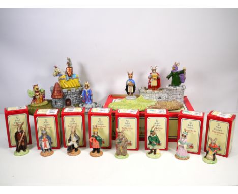 Royal Doulton Bunnykins, Arthurian collection, Robin hood collection - six figures and a base from the Arthurian collection. 