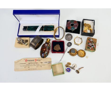 A mixed lot to include wristwatches, brooches, cufflinks, sovereign case, Waterman pen set and other. [W]