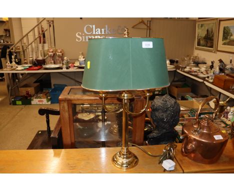 A brass table lamp and shade 