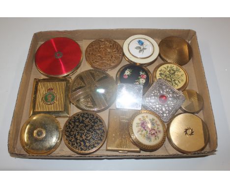 A box of various compacts including Women's Land Army compact