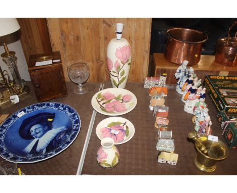 A Moorcroft pottery table lamp, baluster vase, plate and shallow dish, mostly stamped to the base
