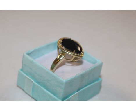 A TGGC Sterling silver gilt and black spinal ring size R/T, approx. 6gms 
