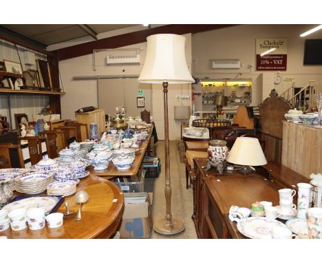 A mahogany standard lamp and shade 