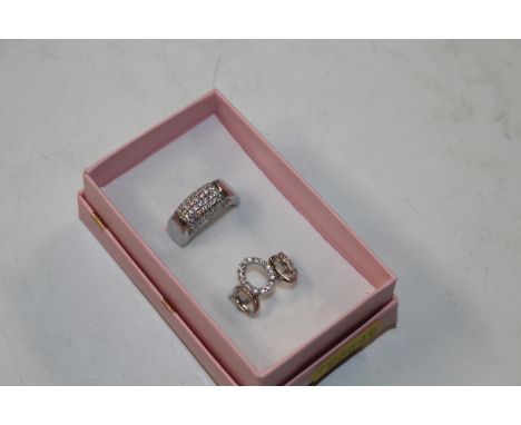 Fossil, Sterling silver and cubic zirconia ring size K/L; and a Sterling silver and cubic zirconia set ring size L