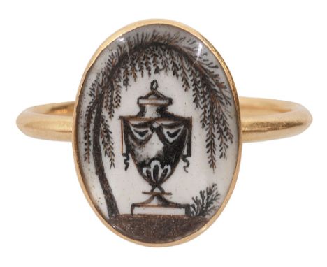 A late 18th century memorial ring, the oval plaque depicting in black ink and hair clippings, a classical urn beneath a respl