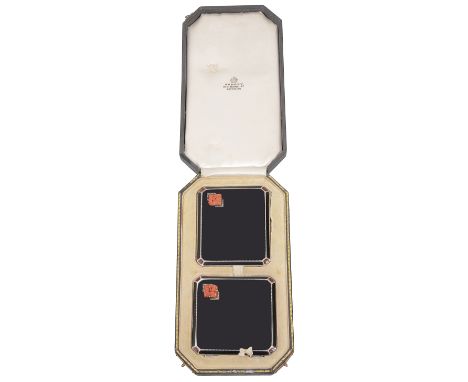 An Asprey silver, enamel and coral compact and cigarette case set, Birmingham, 1933, Art Deco design with black enamelled lid