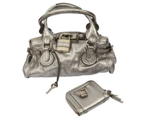 A Chloe Paddington silver leather handbagwith pewter coloured hardware, embellished padlock and Chloe plate, canvas interior,