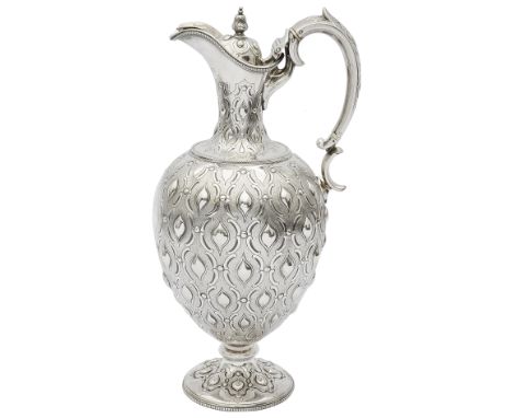 A Victorian silver claret jugSheffield, 1864, makers mark for Martin, Hall &amp; Co., of baluster form raised on a circular s