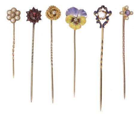 An enamel pansy diamond set stick pin together with five othersincluding a rose diamond end enamel pin, an amethyst and seed 