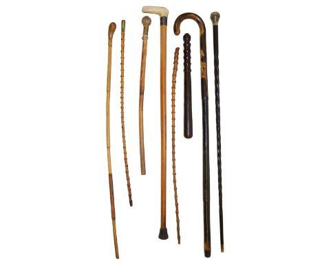 A collection of two walking sticks, four canes, a swagger stick/cosh and a truncheon, (8)various sizesCondition: 