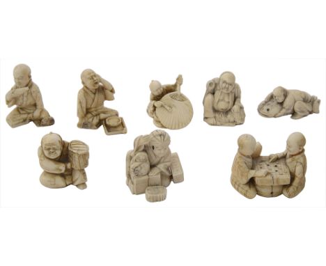 A collection of eight Japanese ivory netsuke, Meiji period, late 19th/early 20th century, including: a pair of figures playin