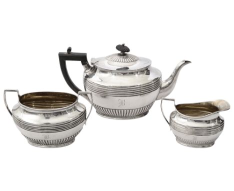 A late Victorian Scottish three piece silver tea serviceEdinburgh, 1899 by Hamilton &amp; Inches of ovoid tapering half flute