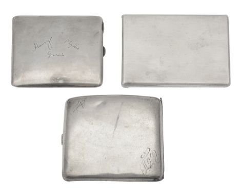 Three twentieth century silver cigarette casesthe first, probably Birmingham, 1939, makers mark for Harman Brothers, engine t