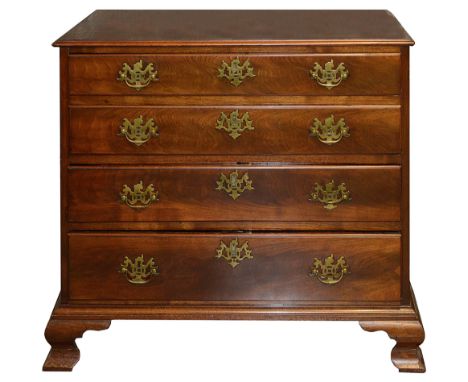 An early George III mahogany chest of drawers, the rectangular moulded crossbanded top, above four graduated drawers, with pi