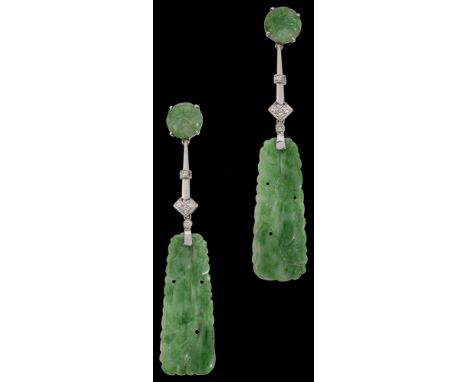 An attractive Art Deco pair of jadeite and diamond-set ear pendants, each designed as a tapering shaped rectangular carved pl