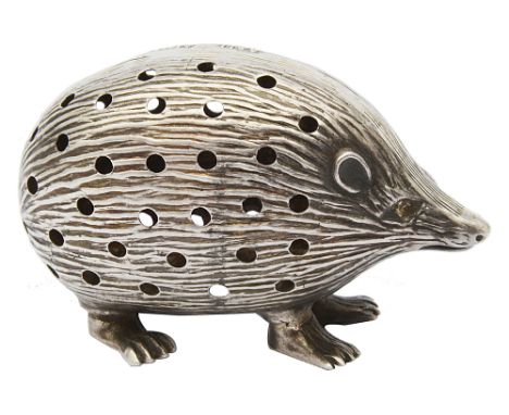 An Edwardian novelty silver hedgehog pin cushionBirmingham, 1906, makers mark for Adie &amp; Lovekin Ltd, with applied red gl