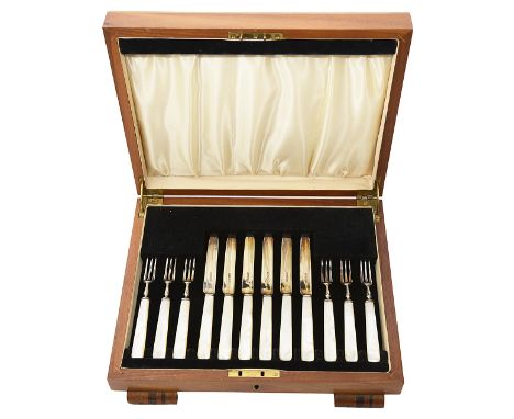 A set of six George V mother of pearl handled fruit knives and forksSheffield, 1933 by James Dixon &amp; Sons Ltdin an Art De