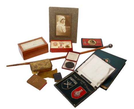 An interesting collection of militaria, First World War and later,including; a piece of canvas inscribed "Envelope of Zeppeli