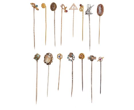 A collection of mainly Victorian and Edwardian stick pins, including a 'cricketing' pin the majority testing for gold, some r