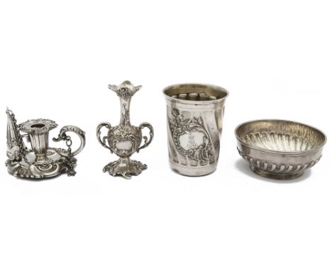 A Victorian silver taper chamber stick, an Austrian .800 beaker, a Continental bud vase and a silver bowl the first Sheffield